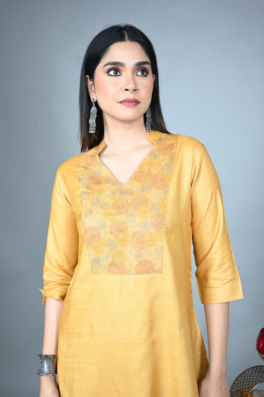 Yellow Tassar A-Line Kurta with Hand Embroidered Yoke and Mud Brown Silk Blend Pants Co-ord Set (set of 2)